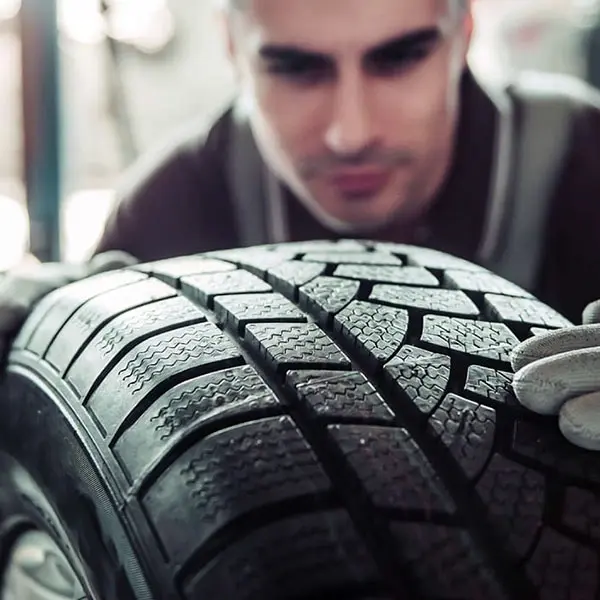 Technician changing tire
